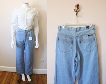 Brittania high rise wide leg jeans | 1970s light wash high waist wide leg denim jeans with studded pockets | 29 – 30 waist