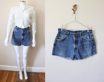 Wrangler distressed denim cutoff shorts | vintage 90s high waisted distressed fringed jean shorts | 34 waist