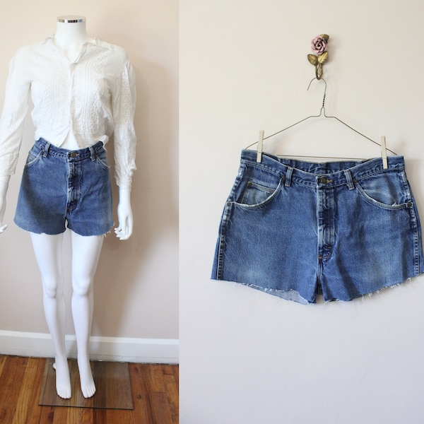 Wrangler distressed denim cutoff shorts | vintage 90s high waisted distressed fringed jean shorts | 34 waist