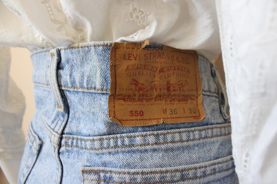 Levis 550 Faded Light Wash Jeans 