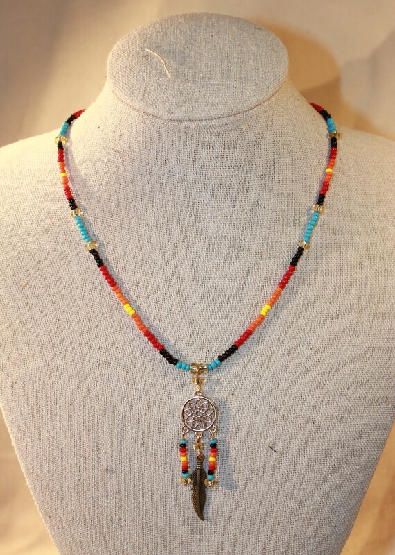 White red and gold necklace in rockery beads