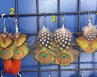 Qualité premium ! Boucles d'oreilles avec plumes d'exception - base : paon. Plumes naturelles