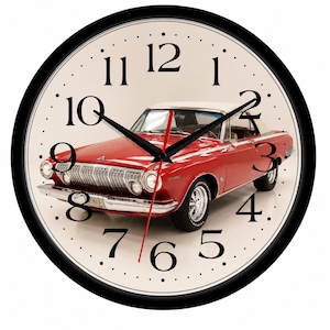 May include: A round wall clock with a black frame and a cream-colored face featuring a vintage red convertible car. The clock has black hour and minute hands, a thin red second hand, and large black serif numerals from one to twelve.