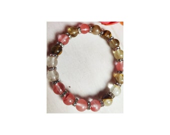 Bracelet de perles en verre rose et rondelles de strass