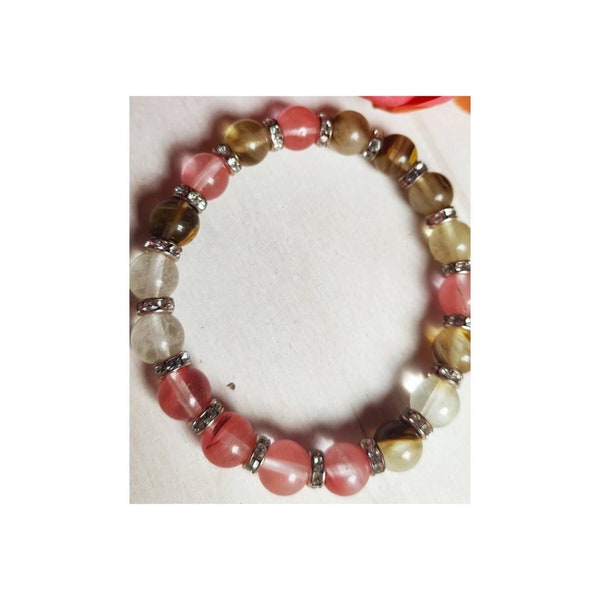 Bracelet de perles en verre rose et rondelles de strass