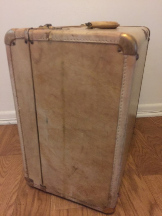 Vintage old cowhide suitcase