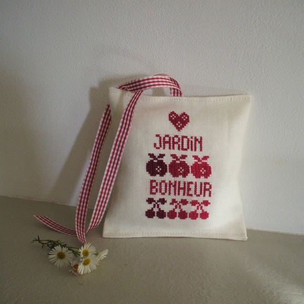 petit coussin de porte ou de fenêtre avec broderie au point de croix