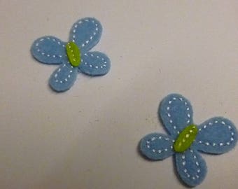 Sewing in shades of blue and green butterflies
