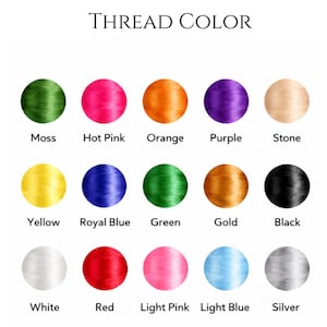 May include: A colour chart showing a range of thread colours. The text "THREAD COLOR" is at the top. Colours include moss, hot pink, orange, purple, stone, yellow, royal blue, green, gold, black, white, red, light pink, light blue, and silver.