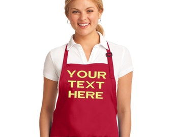 May include: Red apron with a large yellow pocket on the front. The pocket has the text "YOUR TEXT HERE" printed on it.