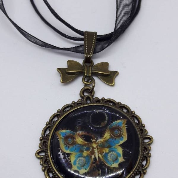 collier steampunk bronze et organza noir avec cabochon papillon doré