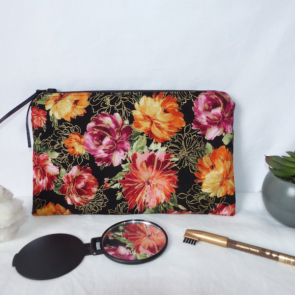 Pochette en tissu noire et dorée, trousse fleurs originale