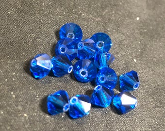Dark blue bicone beads 5 mm