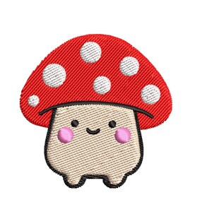 May include: An embroidery design of a cartoon mushroom with a red cap and white spots. The mushroom has a beige stem with pink cheeks and a smiling face. The text "Embroidery Design" is below the mushroom.