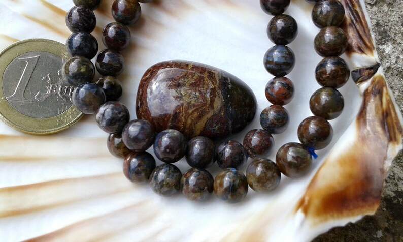 Pietersite AA 7mm round strap beads on elastic thread