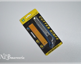 Cutter professional refillable self - 18 mm - 8 blades included