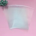 Transparent adhesive plastic bags sold in packs of 50