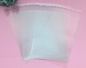 Transparent adhesive plastic bags sold in batches of 50