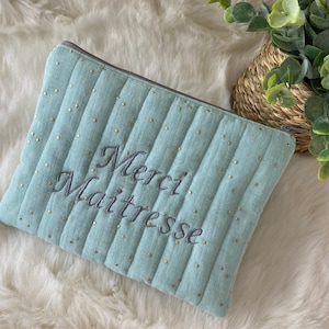 Pochette matelassée à pois dorés