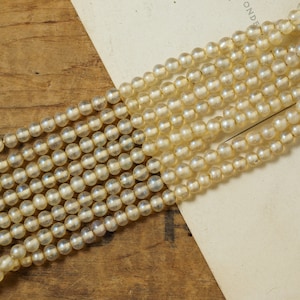 Vintage Japanese Pearlescent Glass 6x9mm Round Beads 19&quot; Strand
