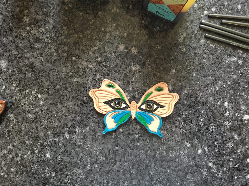 the look of the butterfly pattern Tooled leather hair Barrette