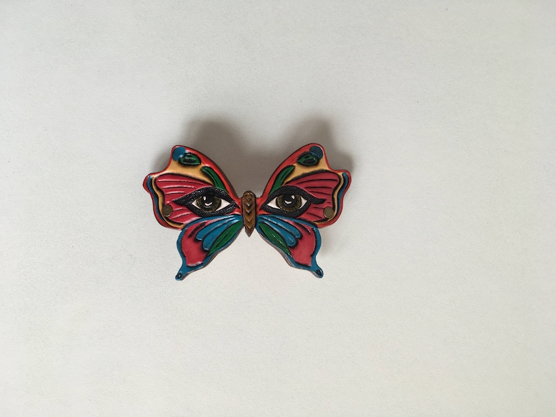 the look of the butterfly pattern Tooled leather hair Barrette