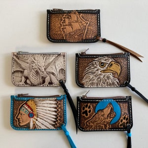 Porte-monnaie en cuir repoussé, divers motifs