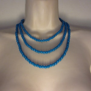 Multi-row necklace of blue beads