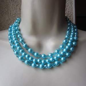 Multi-row necklace of blue beads