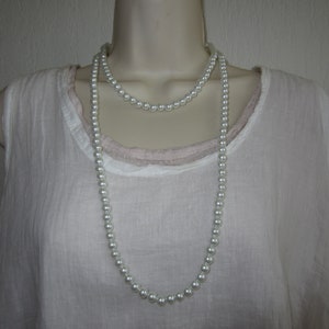 White multi-row necklace made of glass beads