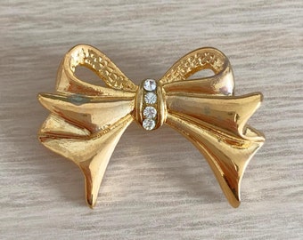 Broche vintage en ruban doré avec strass