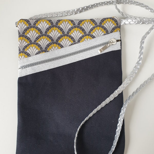 le  sac- pochette bandoulière en toile de coton noir et tissu à palmettes  bandoulière argent - taille M