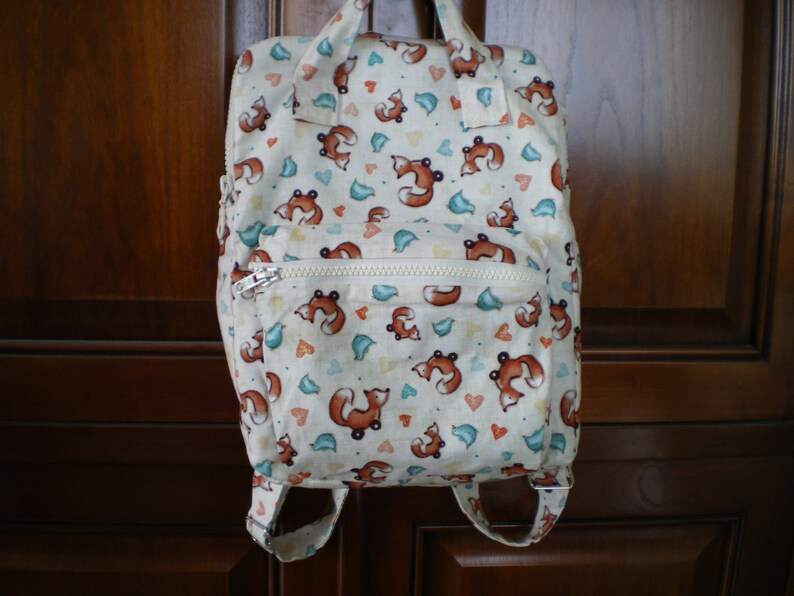 patchwork fabric Gorjuss Child backpack ecru background fox motifs,2 straps and 2 handles