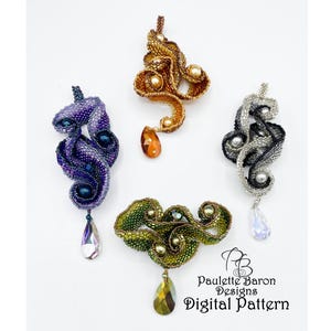 May include: Four beaded pendants in different colors, each with a teardrop-shaped crystal hanging from the bottom. The pendants are made of small beads in a swirling pattern, with pearl-like beads interspersed throughout. The colors are purple, gold, silver, and green.