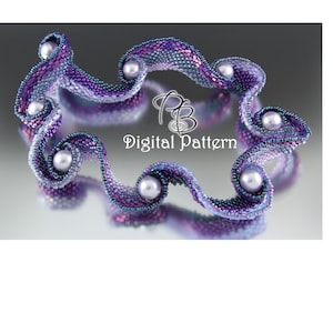 May include: A beaded bracelet in shades of purple and blue, with white pearl accents. The bracelet has a wavy design and is labeled "Digital Pattern".