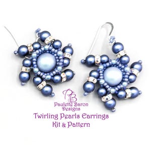 May include: A pair of earrings featuring a central light blue pearl surrounded by smaller dark blue pearls and silver-toned crystal spacers in a starburst pattern. The text reads: Paulette Baron Designs Twirling Pearls Earrings Kit & Pattern.