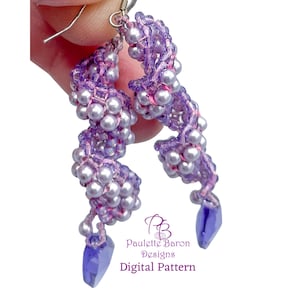 May include: Handmade lavender beaded earrings with dangling purple crystal accents. The earrings feature a spiral design with clusters of small, pearlescent beads. The text "Paulette Baron Designs Digital Pattern" is visible.