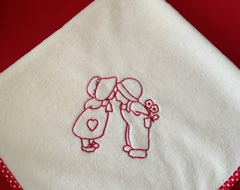 Embroidered hand towel on bamboo sponge