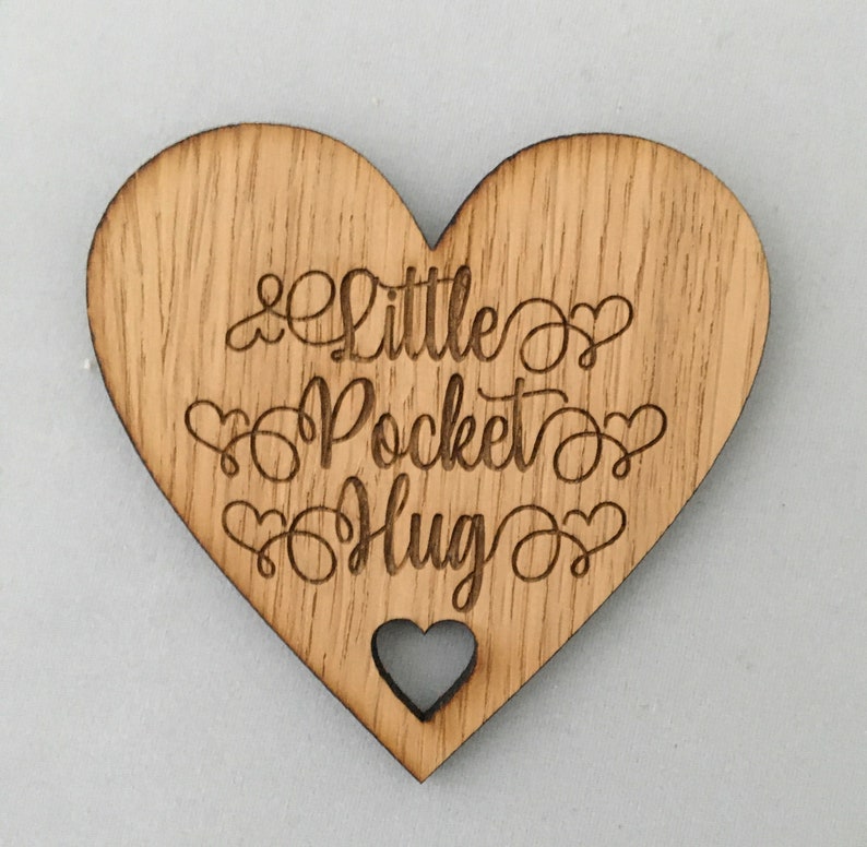 Style 1 Little Pocket Hugs wooden hearts to show our Etsy