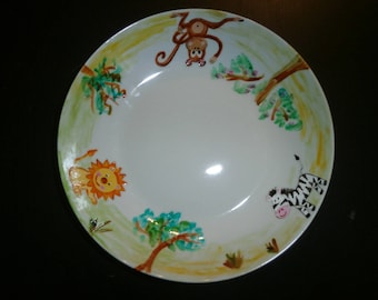 assiette creuse porcelaine peinte motif singe, lion, zèbre