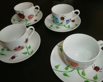 painted porcelain cup "ladybug garden" multicolored