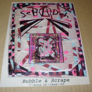 May include: A rectangular promotional flyer for the Sebadoh album Bubble & Scrape. The design features a collage of pink, light blue, and black geometric shapes with the text seBADoh at the top and Bubble & Scrape 17-Song LP Cass CD at the bottom.