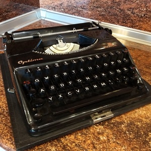 Vintage 1951 typewriter Optima Plana  Working typewriter Optima Vintage typewriter Portable typewriter German typewriter Retro office decor