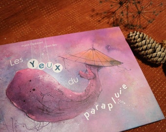 Livre pour enfants en français. Album jeunesse illustré. Titre:"Les yeux du parapluie". L'histoire d'un petit garçon caché sous un parapluie