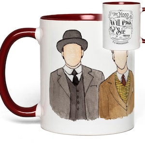 May include: White ceramic mug with a burgundy interior and handle. The mug features a watercolor illustration of two figures in suits and hats. The text "The Mood Will Pass Sir - Jeeves P.G. Wodehouse" is printed on the side.