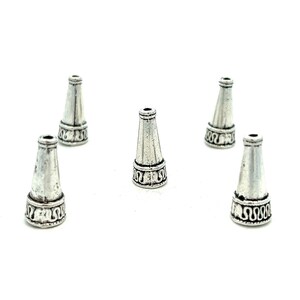 May include: Five silver-colored cone-shaped beads with a decorative band near the base. The beads have a slightly aged appearance and are arranged against a white background. These beads are suitable for jewelry making.