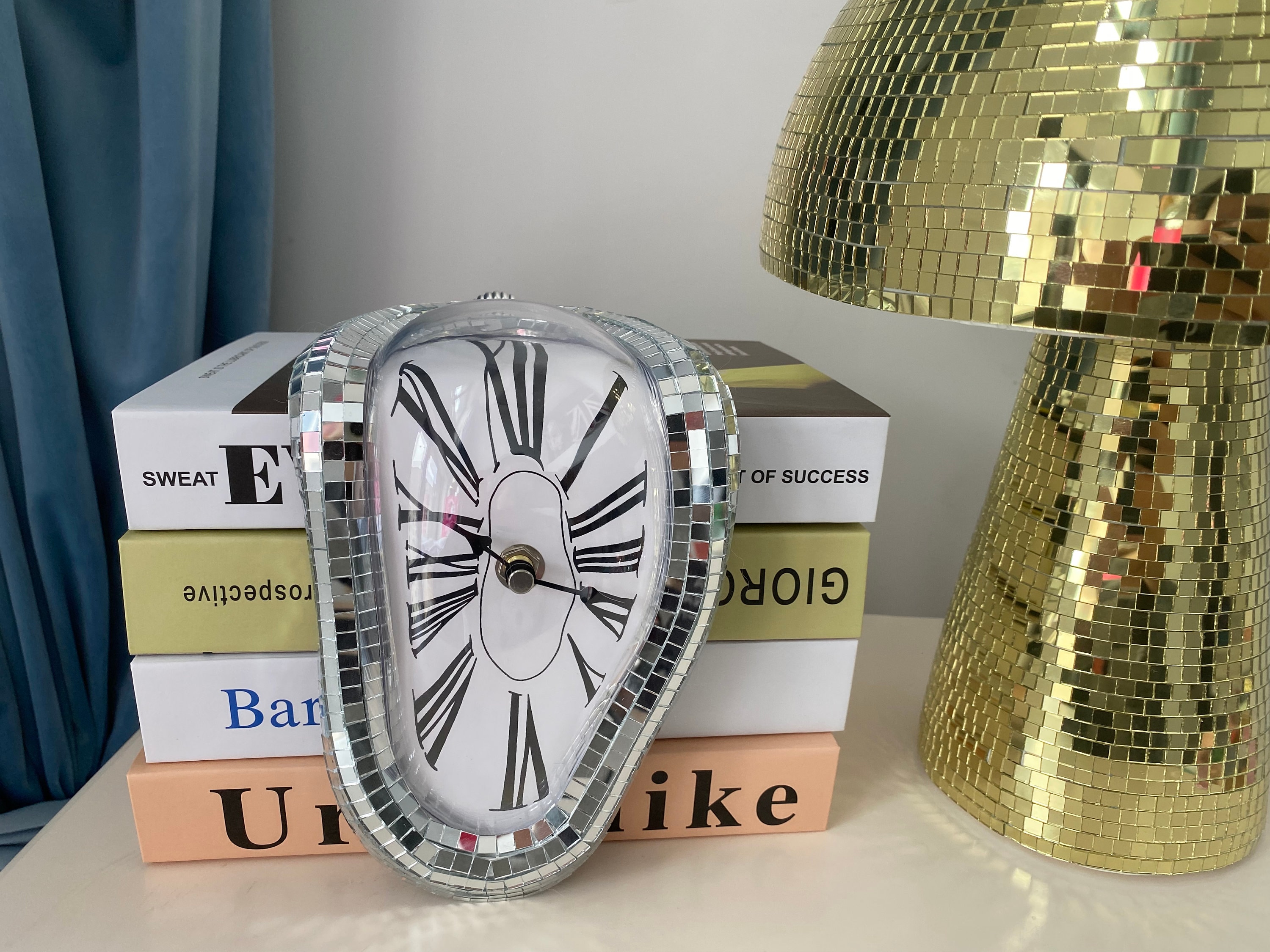 FAREVER Melting Clock, Salvador Dali Watch Melted Clock for Decorative Home  Office Shelf Desk Table …See more FAREVER Melting Clock, Salvador Dali
