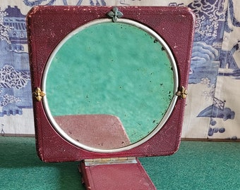 Gorgeous antique leather campaign close up mirror