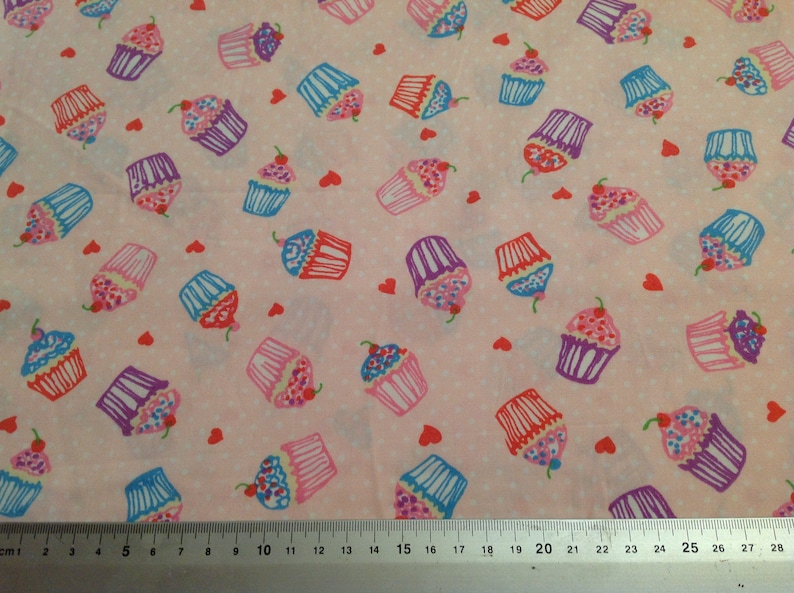 Bicycles flowers hearts balloons and glitter on yellow cotton fabric fat quarter