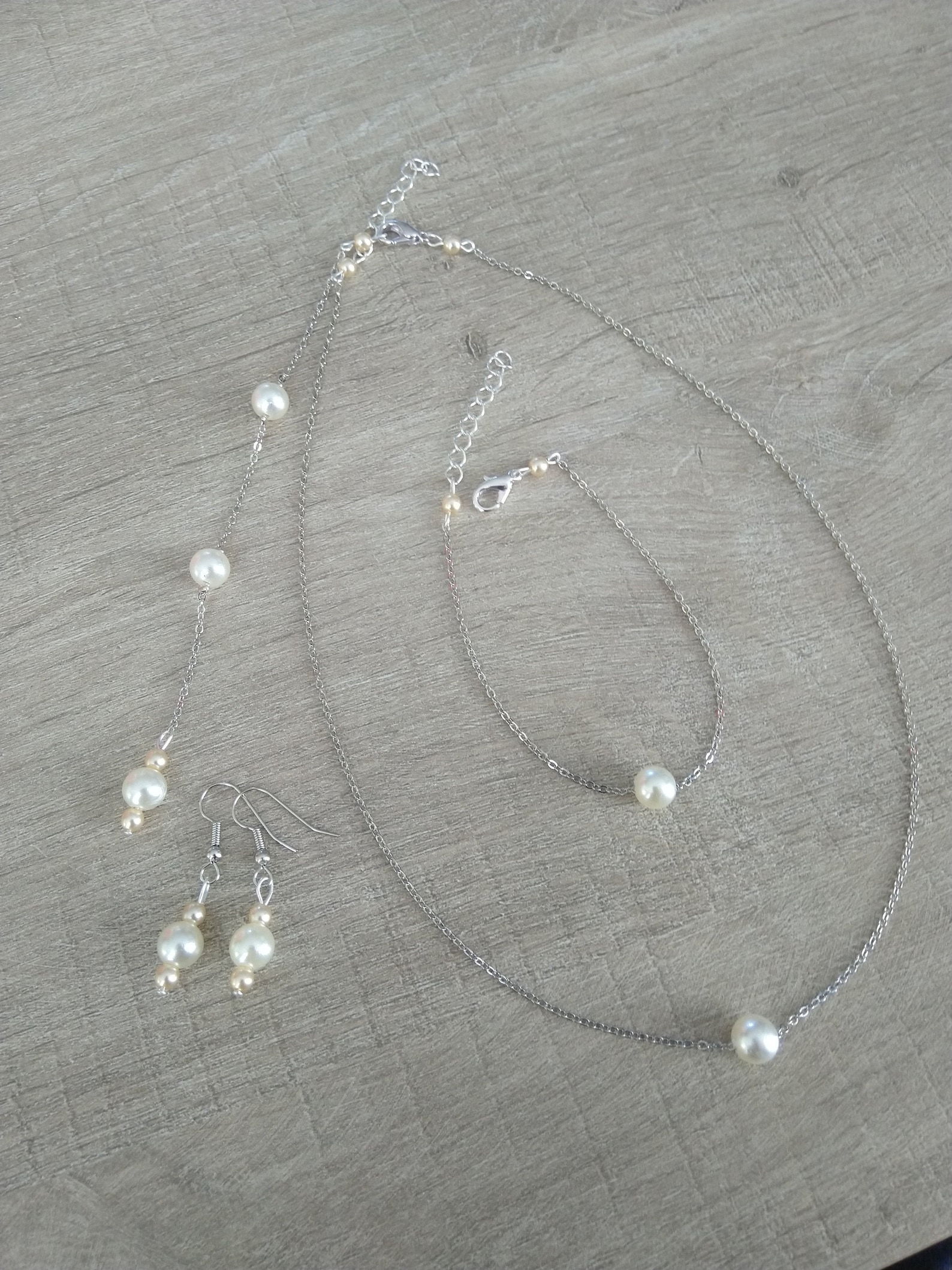 Ushiny Parure de bijoux de mariage en argent avec strass scintillants, collier, bracelet, boucles d'oreilles, convient pour robe de mariée pour femme et fille